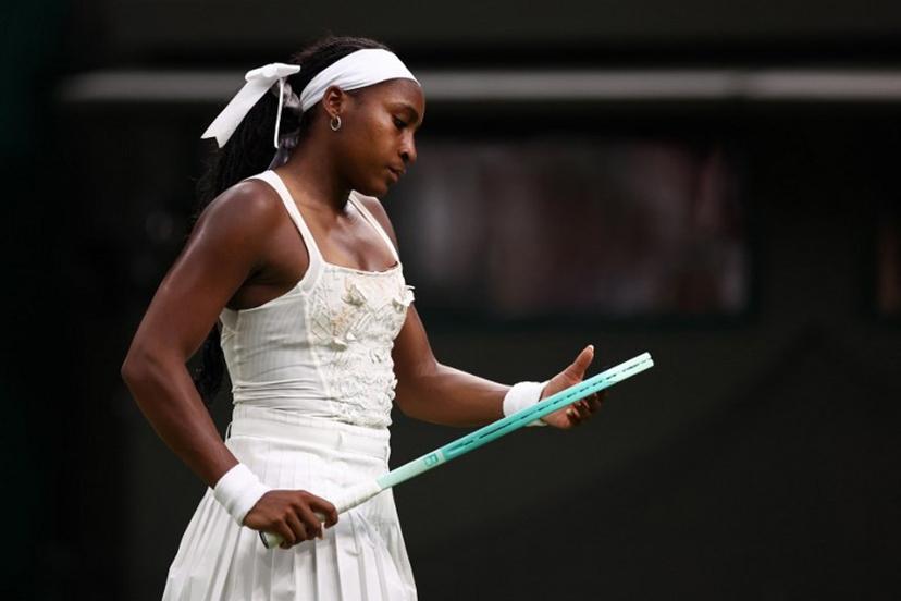 US player Coco Gauff reacts as she plays against Ukraine's Dayana Yastremska during their women's singles first round tennis match on the second day of the 2025 Wimbledon Championships at The All England Lawn Tennis and Croquet Club in Wimbledon, southwest London, on July 1, 2025.  HENRY NICHOLLS / AFP