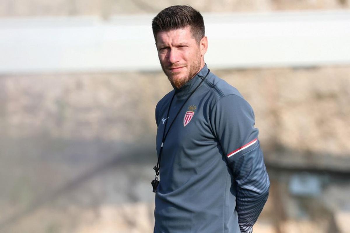 The new head coach of AS Monaco, Belgian Sebastien Pocognoli, looks on during a training session in La Turbie southeastern France, near Monaco, on October 14, 2025. The Belgian coach has signed a contract until June 2027, succeeding Austrian Adi Hutter, who was sacked due to an unsatisfactory start to the season. Valery HACHE / AFP
