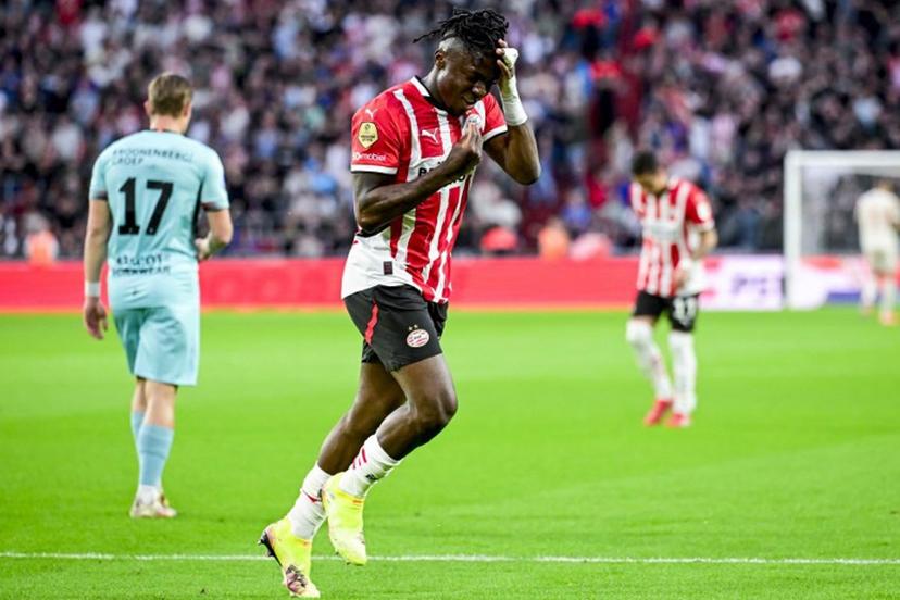 Eindhoven's Belgian forward #11 Johan Bakayoko celebrates scoring his team's second goal during the Dutch Eredivisie fooball match between PSV Eindhoven and Almere City FC at the Phillips Stadium in Eindhoven on April 12, 2025.  Olaf Kraak / ANP / AFP