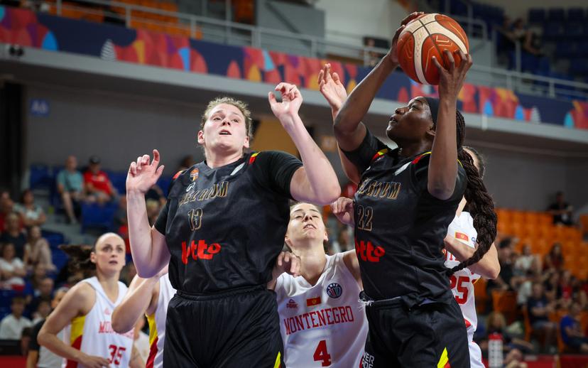 Belgium's Kyara Linskens and Belgium's Bethy Mununga fight for the ball during the second game in the group stage (group C) between Montenegro and Belgian national women team 'the Belgian Cats', in Brno, Czech Republlic, on Friday 20 June 2025, at the FIBA Women's EuroBasket 2025. BELGA PHOTO VIRGINIE LEFOUR