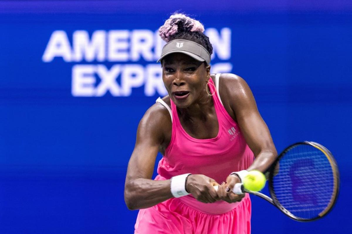 USA's Venus Williams plays a backhand return against Belgium's Greet Minnen during the US Open tennis tournament women's singles first round match at the USTA Billie Jean King National Tennis Center in New York City, on August 29, 2023.  COREY SIPKIN / AFP