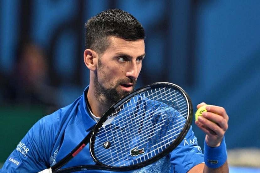 Serbia's Novak Djokovic serves against Italy's Matteo Berettini during their men's singles match at the ATP Qatar Open tennis tournament in Doha on February 18, 2025.  Mahmud HAMS / AFP