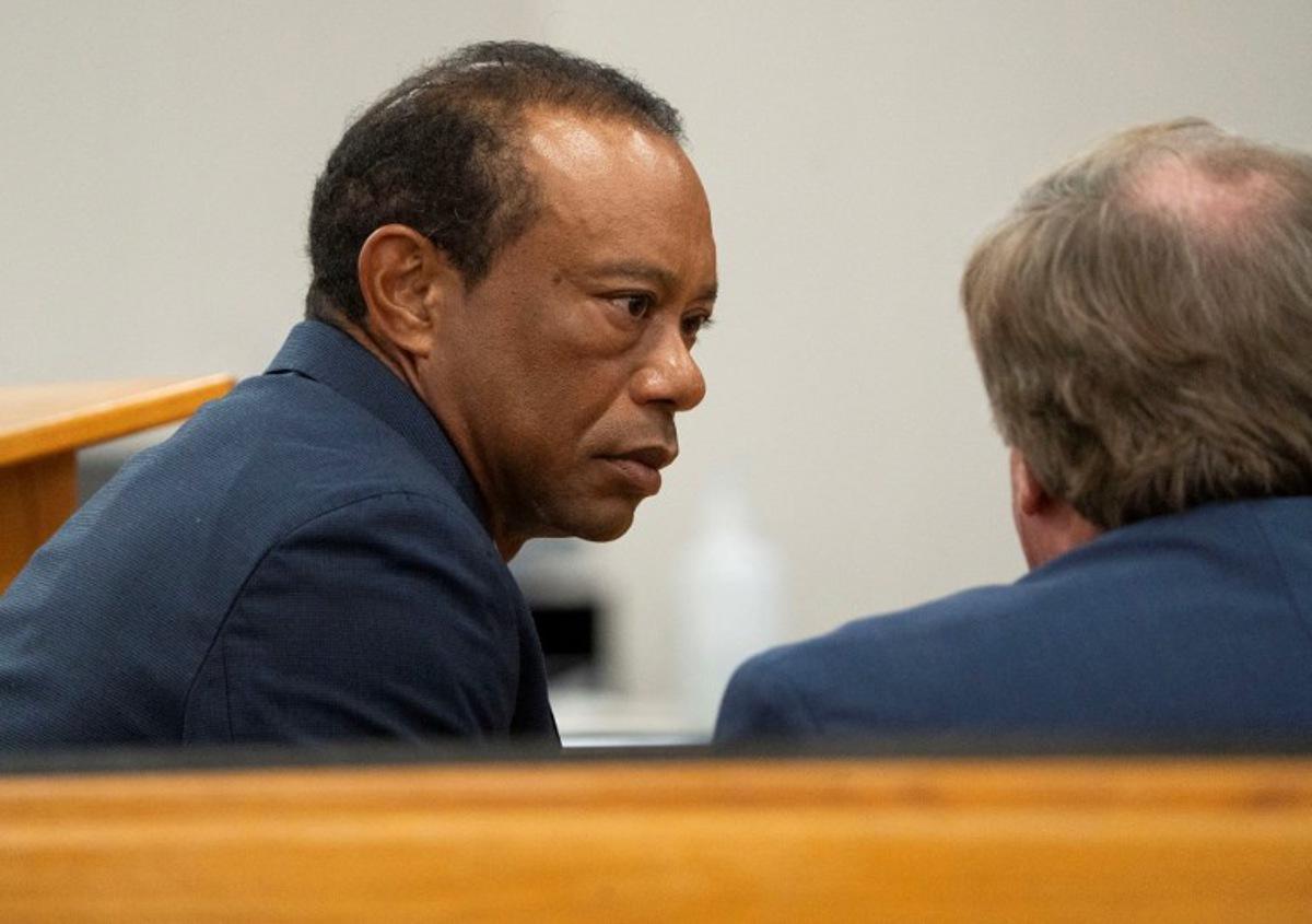 US golfer Tiger Woods appears in County Judge Darren Steele's courtroom for a plea hearing from an arrest in March at the Martin County Courthouse in Stuart, Florida in September 2, 2026.  Tiger Woods pleaded guilty on Wednesday to charges of careless and reckless driving stemming from a rollover car crash in Florida in March.  Crystal Vander Weit / POOL / AFP