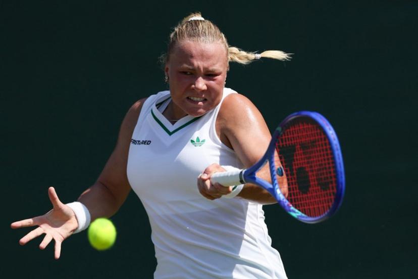 Russia's Diana Shnaider plays a forehand return to Japan's Moyuka Uchijima during their women's singles first round tennis match on the first day of the 2025 Wimbledon Championships at The All England Lawn Tennis and Croquet Club in Wimbledon, southwest London, on June 30, 2025.  Adrian Dennis / AFP