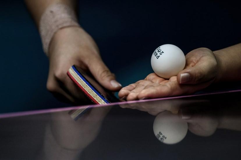South Korea's Shin Yubin prepares to serve to Japan's Miu Hirano during their women's table tennis singles quarter-finals at the Paris 2024 Olympic Games at the South Paris Arena in Paris on August 1, 2024.   JEFF PACHOUD / AFP