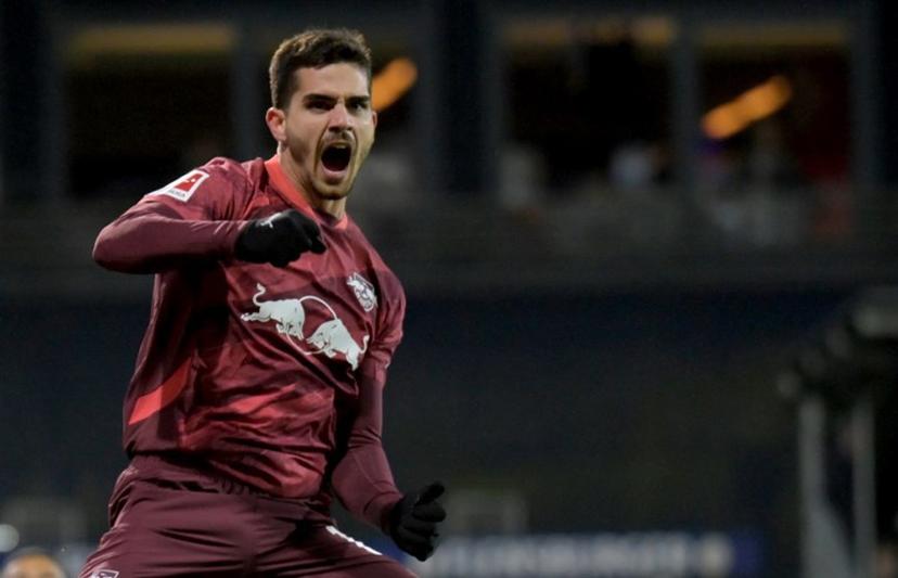 Leipzig's Portuguese forward #19 Andre Silva celebrates after scoring the 0-2 goal during the German first division Bundesliga football match between Holstein Kiel and RB Leipzig in Kiel, northern Germany, on December 7, 2024.  FABIAN BIMMER / AFP