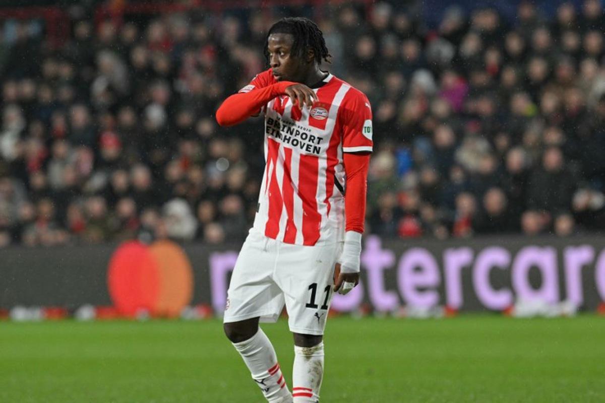 PSV Eindhoven's Belgian forward #11 Johan Bakayoko reacts during the UEFA Champions League, league phase day 8, football match between PSV Eindhoven (NED) and Liverpool FC (ENG) at the the Philips Stadion, in Eindhoven, on January 29, 2025.  NICOLAS TUCAT / AFP