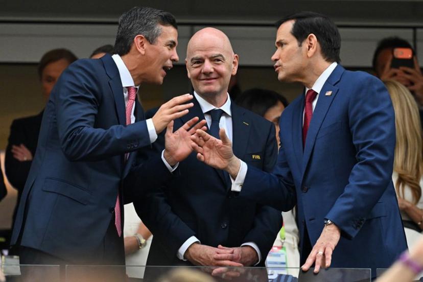 (L-R) Paraguayan President Santiago Pena, FIFA president Gianni Infantino, and US Secretary of State Marco Rubio talk ahead of the 2026 World Cup Group D football match between USA and Paraguay at the Los Angeles Stadium in Inglewood on June 12, 2026.  Patrick T. Fallon / AFP