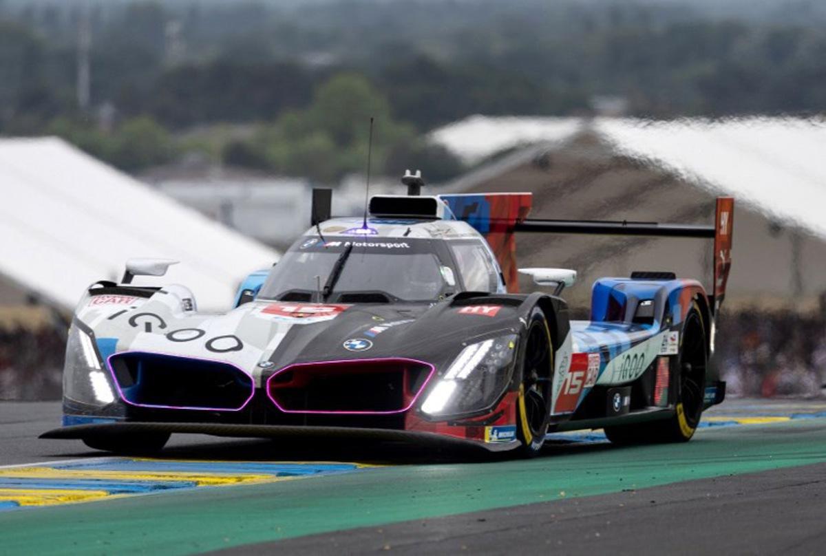 BMW M Team WRT's Belgian driver #15 Dries Vanthoor steers his hypercar during the 2025 Le Mans 24 hour endurance race, at the Le Mans circuit, in north-western France on June 14, 2025.  Fred TANNEAU / AFP