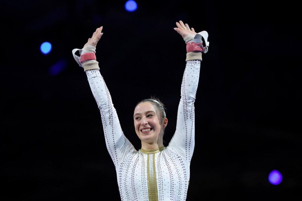 Belgium's Nina Derwael celebrates after winning the women's uneven bars final of the Men's and Women's Artistic Gymnastics European Championships in Leipzig, eastern Germany on May 30, 2025.  Ronny HARTMANN / AFP