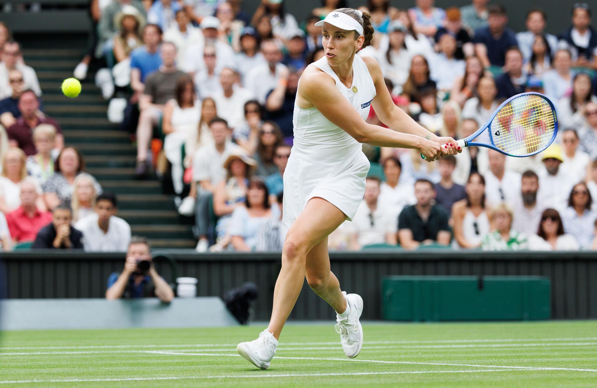 Belgian Elise Mertens pictured in action during a tennis match against Belarusian Sabalenka, in the round of 16 of the women's singles at the 2025 Wimbledon grand slam tournament, Sunday 06 July 2025 at the All England Tennis Club, in South-West London, Britain. BELGA PHOTO BENOIT DOPPAGNE