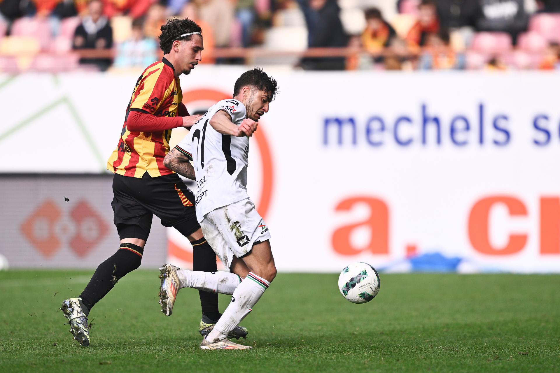 Mechelen's Jose Marsa and OHL's Oscar Gil Regano fight for the ball during a soccer match between KV Mechelen and Oud-Heverlee Leuven, Sunday 13 April 2025 in Mechelen, on day 3 (out of 10) of the Europe Play-offs of the 2024-2025 'Jupiler Pro League' first division of the Belgian championship. BELGA PHOTO JOHAN EYCKENS