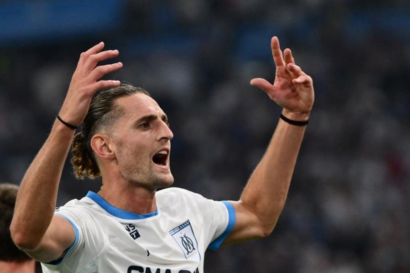Marseille's French midfielder #25 Adrien Rabiot celebrates after scoring during their ligue 1 football match Olympic of Marseille (OM) against stade Rennais at the Velodrome stadium in Marseille on May 17, 2025.  Christophe SIMON / AFP