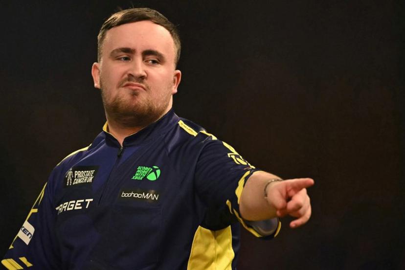 England's Luke Littler reacts while playing against Netherlands' Michael van Gerwen during the PDC World Darts Championship final, at Alexandra Palace in London on January 3, 2025.  Ben STANSALL / AFP