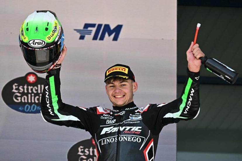 Second placed Fantic Racing's Belgian rider Barry Baltus celebrates on the podium after the Spanish Moto2 Grand Prix at the Jerez racetrack in Jerez de la Frontera, on April 27, 2025.  JAVIER SORIANO / AFP