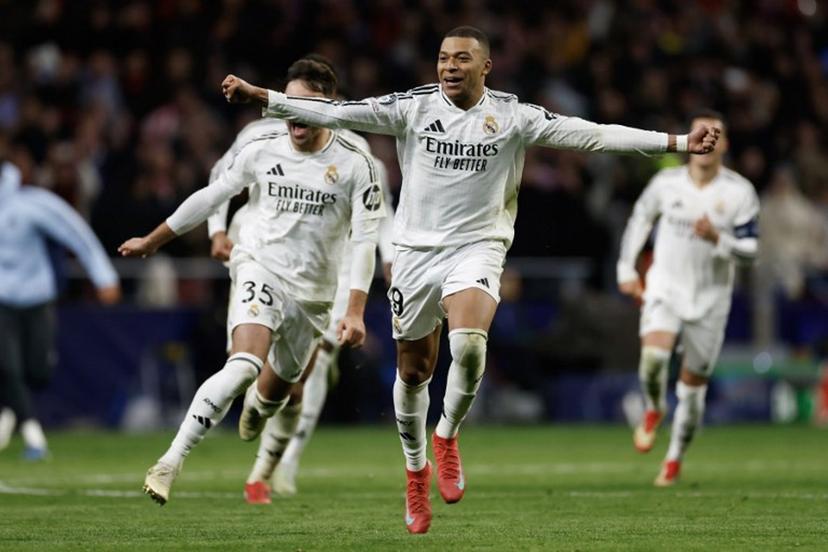 Real Madrid's French forward #09 Kylian Mbappe celebrates during a penalty shootout during the UEFA Champions League Round of 16 second leg football match between Club Atletico de Madrid and Real Madrid CF at the Metropolitano stadium in Madrid on March 12, 2025.  Oscar DEL POZO CAÑAS / AFP