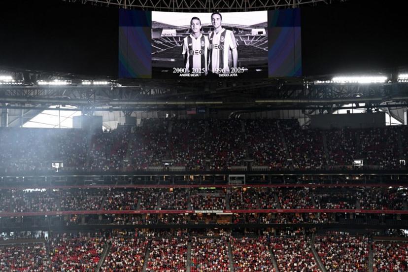 View of a screen with the image of Liverpool's Portuguese forward Diogo Jota and his brother Andre Silva, who passed away after a car crash, during a minute of silence in their honor ahead of the FIFA Club World Cup 2025 quarterfinal football match between France's Paris Saint-Germain and Germany's Bayern Munich at the Mercedes-Benz Stadium in Atlanta on July 5, 2025.  Roberto SCHMIDT / AFP
