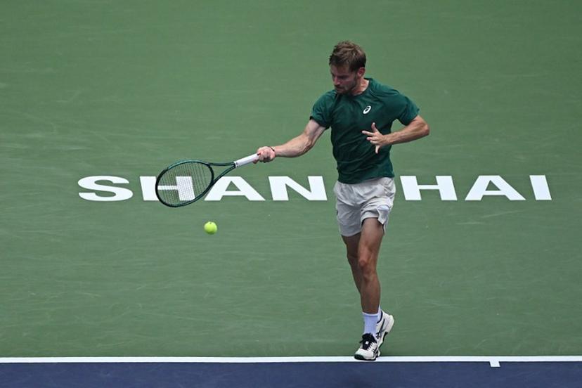 Belgium's David Goffin hits a return to USA's Ben Shelton during their men's singles match at the Shanghai Masters tennis tournament in Shanghai on October 3, 2025.  Jade Gao / AFP