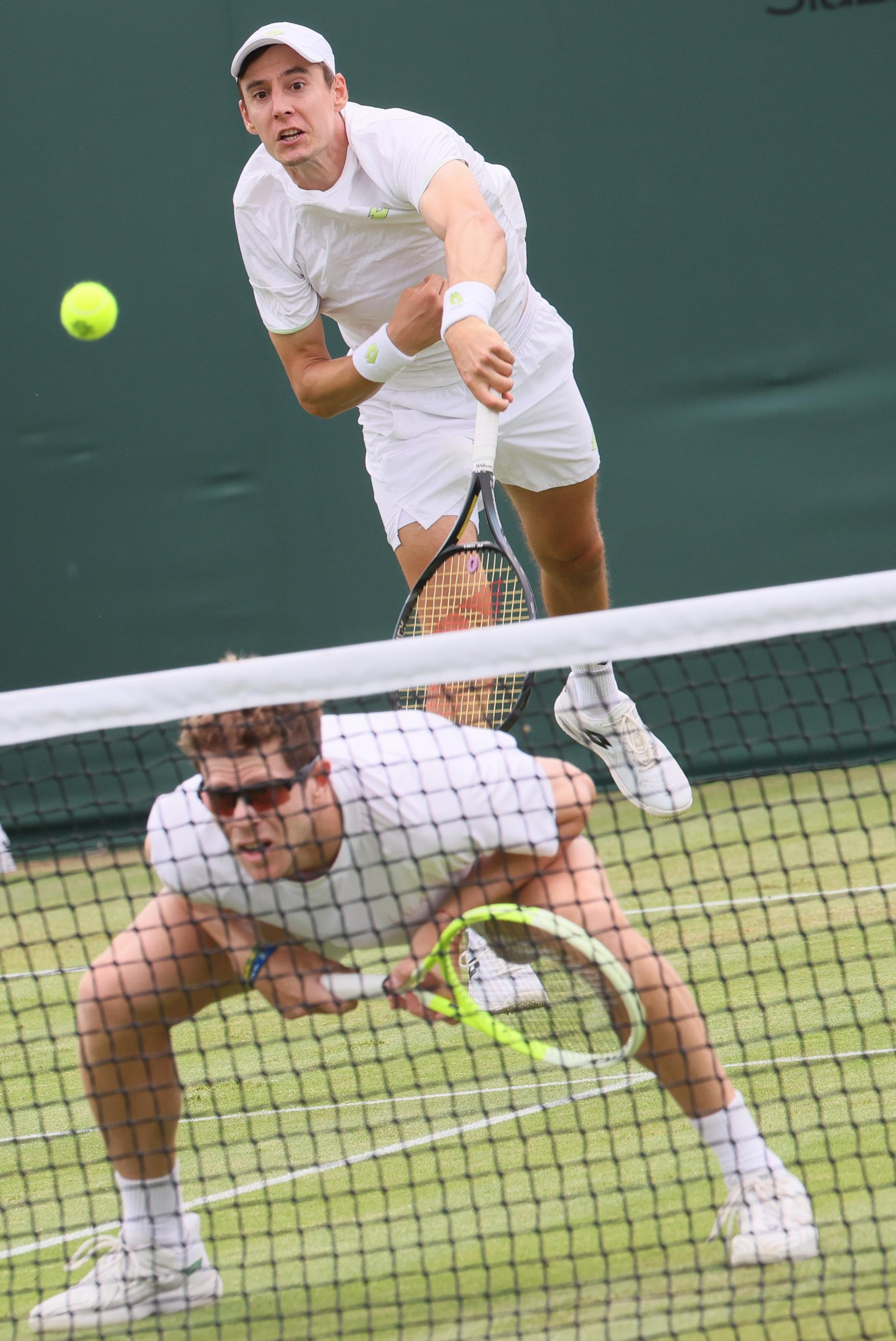 Belgian Joran Vliegen and Uruguayan Ariel Behar pictured during a doubles tennis match against Italian pair Vavassori - Bolelli, in the first round of the men's doubles at the 2025 Wimbledon grand slam tournament, Wednesday 02 July 2025 at the All England Tennis Club, in South-West London, Britain. BELGA PHOTO BENOIT DOPPAGNE