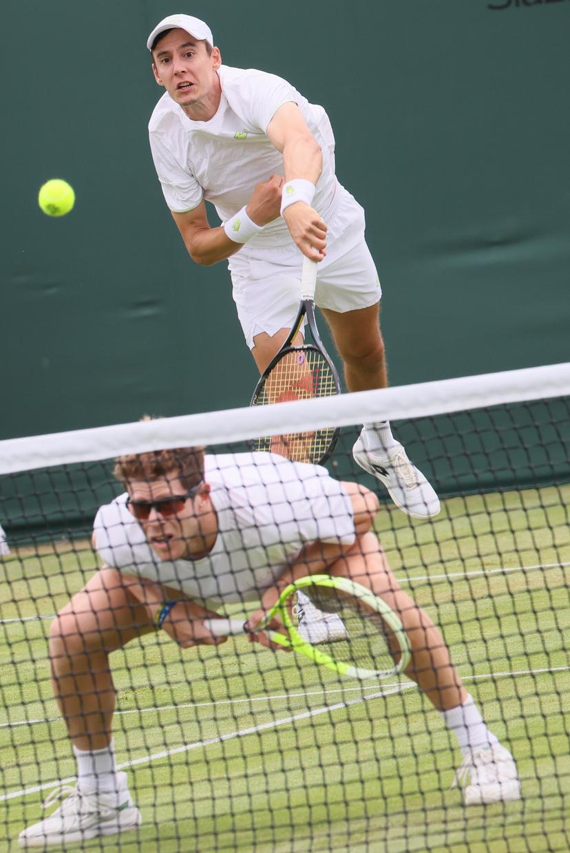 Belgian Joran Vliegen and Uruguayan Ariel Behar pictured during a doubles tennis match against Italian pair Vavassori - Bolelli, in the first round of the men's doubles at the 2025 Wimbledon grand slam tournament, Wednesday 02 July 2025 at the All England Tennis Club, in South-West London, Britain. BELGA PHOTO BENOIT DOPPAGNE
