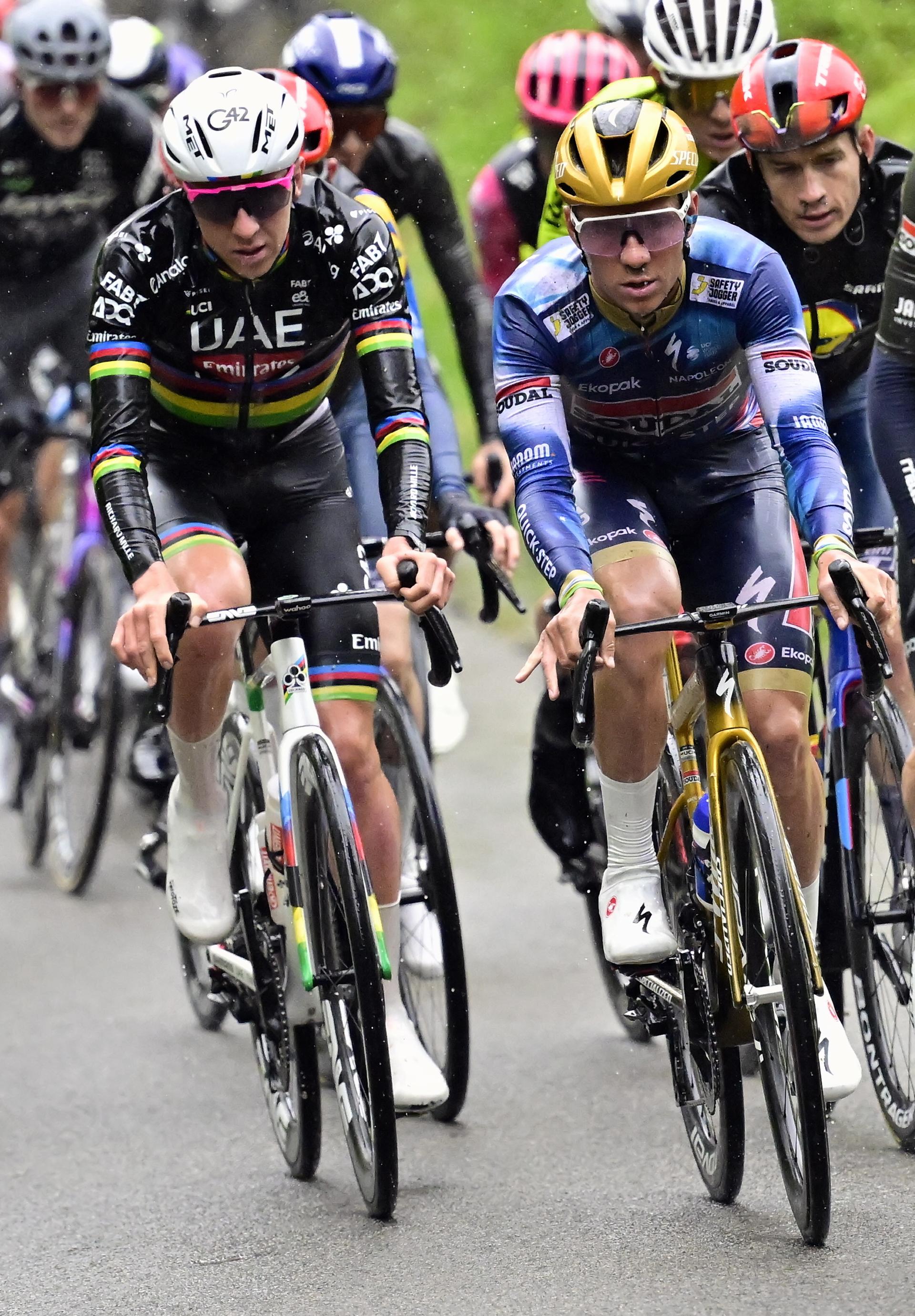 Slovenian Tadej Pogacar of UAE Team Emirates and Belgian Remco Evenepoel of Soudal Quick-Step pictured in action during the men's race of the 'La Fleche Wallonne', one day cycling race (Waalse Pijl - Walloon Arrow), 205,2 km from Ciney to Huy, Wednesday 23 April 2025. BELGA PHOTO DIRK WAEM