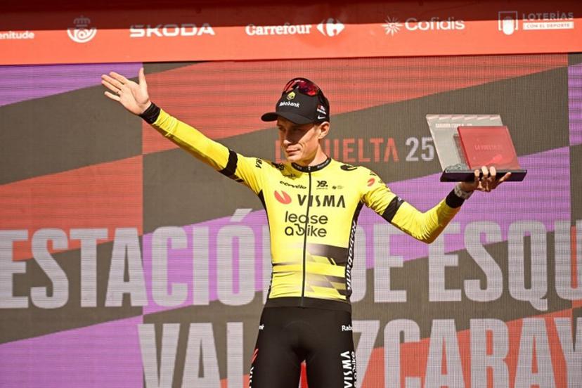 Team Visma-Lease a bike's Danish rider Jonas Vingegaard celebrates on stage after winning the 9th stage of the Vuelta a Espana, a 195 km race between Alfaro and Valdezcaray, on August 31, 2025.    ANDER GILLENEA / AFP