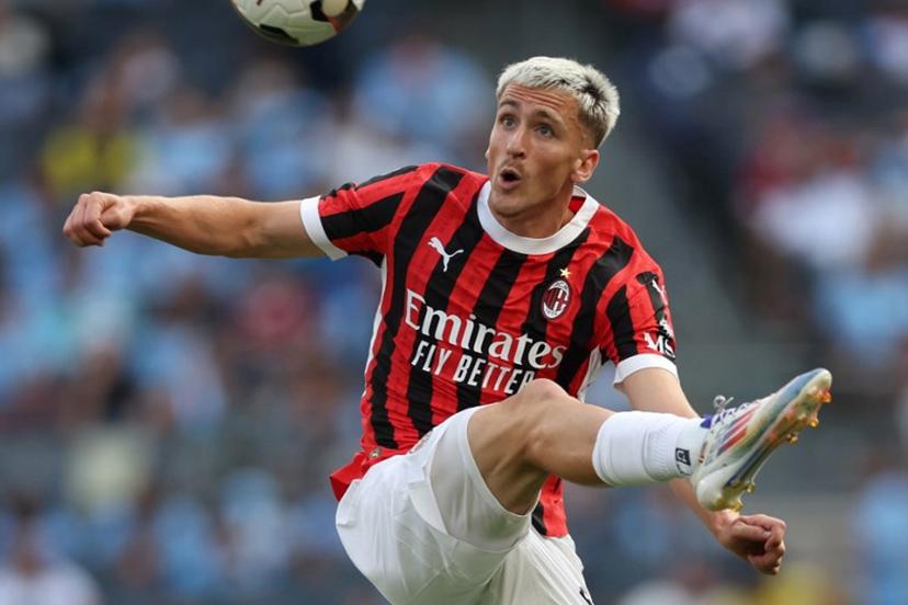 AC Milan's Belgian midfielder #56 Alexis Saelemaekers controls the ball during the pre-season club friendly football match between Manchester City and AC Milan at Yankee Stadium in New York on July 27, 2024.  Charly TRIBALLEAU / AFP