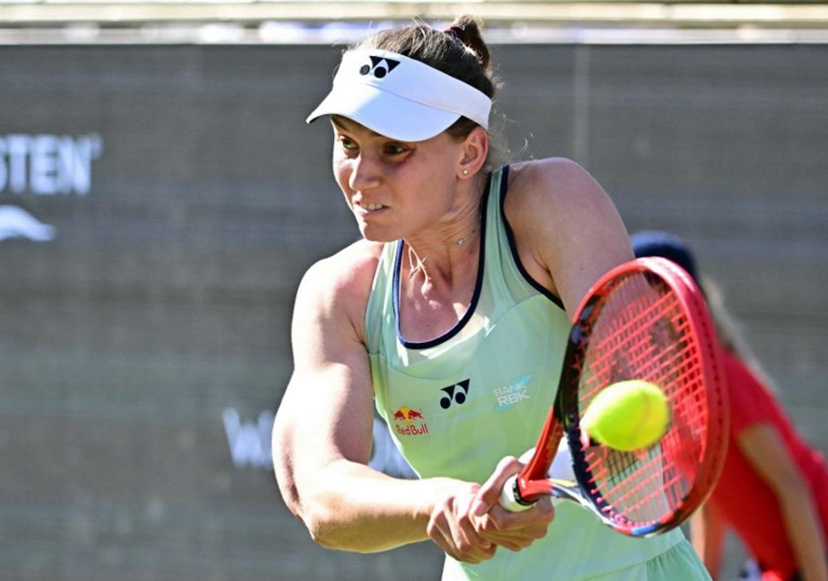 Kazakhstan's Elena Rybakina returns a ball to Belarus' Aryna Sabalenka during their match at the WTA tennis tournament in Berlin, Germany, on June 20, 2025.  Tobias SCHWARZ / AFP