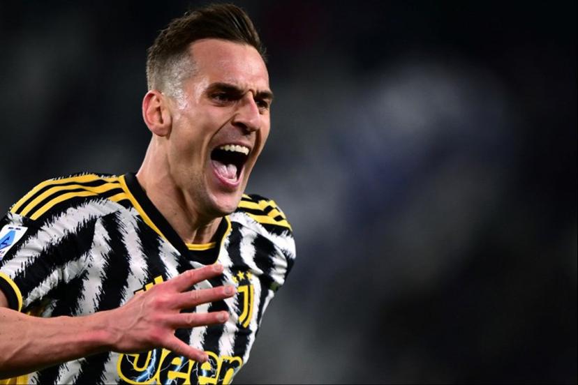 Juventus' Polish forward #14 Arkadiusz Milik reacts after scoring his team's second goal during the Italian Serie A football match between Juventus and Atalanta at the Allianz Stadium in Turin, on March 10, 2024.  MARCO BERTORELLO / AFP