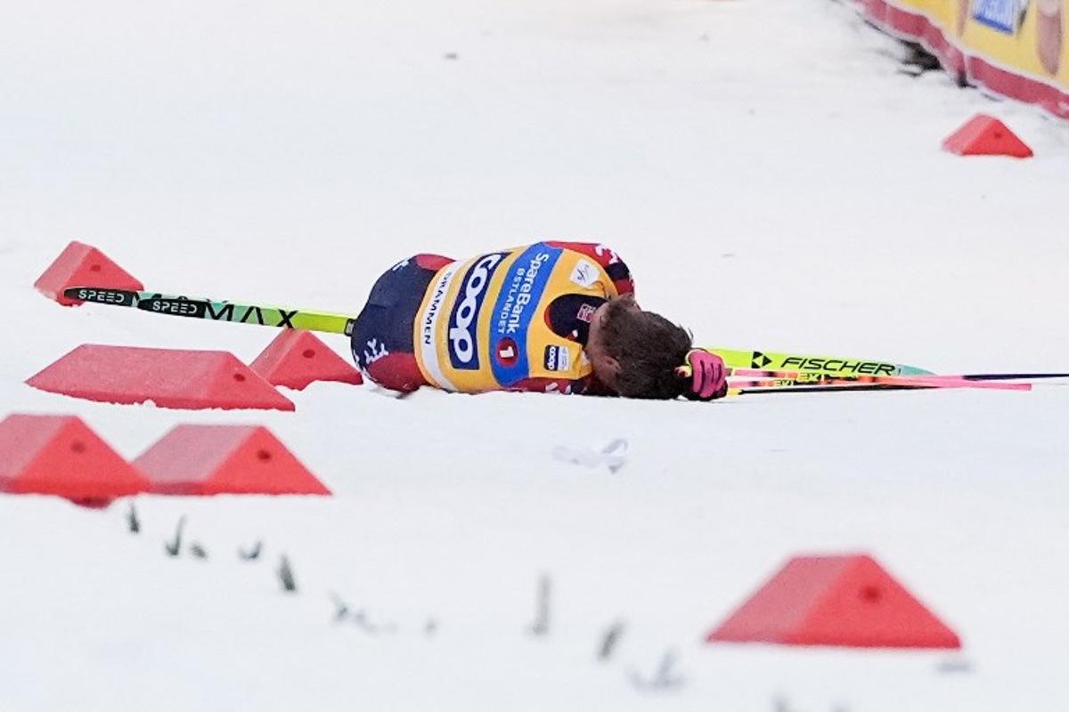 Johannes Hosflot Klaebo reacts after falling during the World Cup sprint cross-country race in Drammen, Norway on March 12, 2026.   Lise Åserud / NTB / AFP