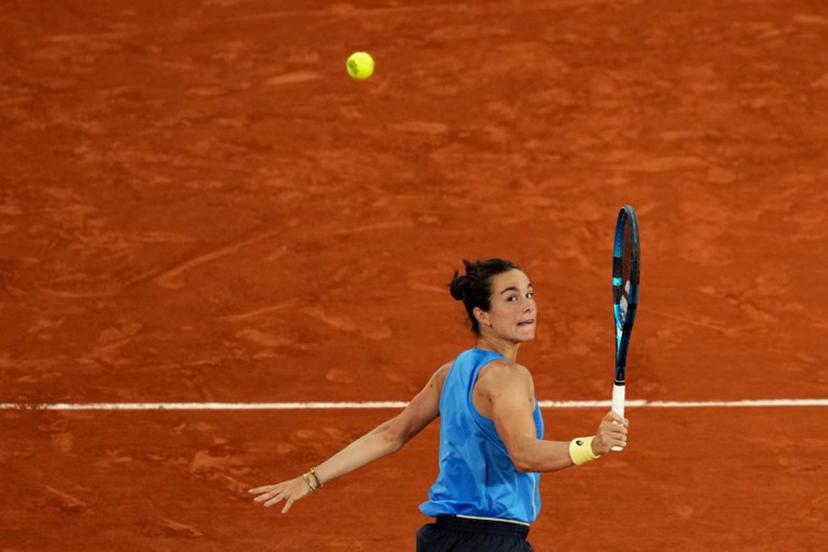 France's Lois Boisson eyes the ball as she plays against Russia's Mirra Andreeva during their women's singles quarter-final match on day 11 of the French Open tennis tournament on Court Philippe-Chatrier at the Roland-Garros Complex in Paris on June 4, 2025.  Dimitar DILKOFF / AFP