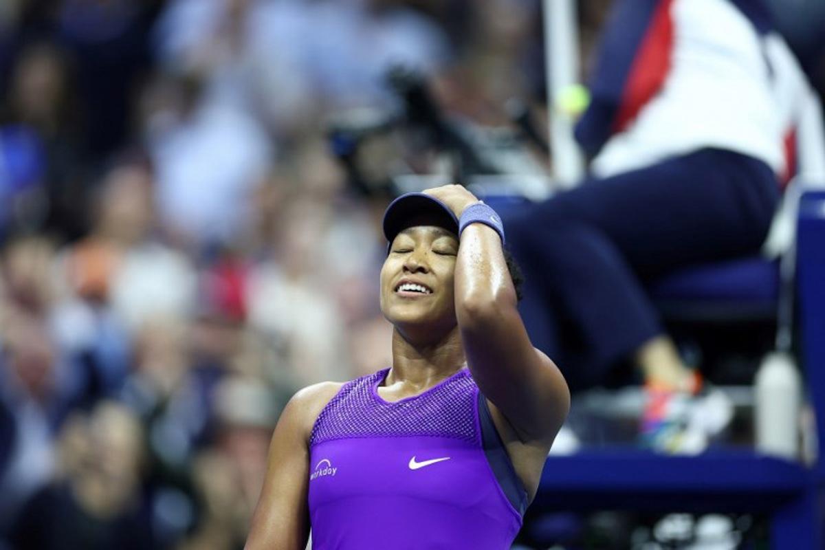 Japan's Naomi Osaka celebrates defeating Czech Republic's Karolina Muchova in their women's singles quarterfinal tennis match on day eleven of the US Open tennis tournament at the USTA Billie Jean King National Tennis Center in New York City on September 3, 2025.  CHARLY TRIBALLEAU / AFP