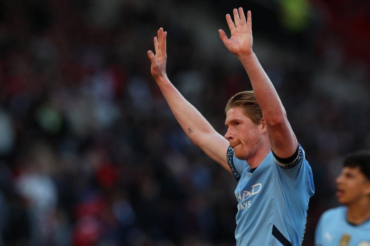 Manchester City's Belgian midfielder #17 Kevin De Bruyne gestures to fans after the English Premier League football match between Manchester United and Manchester City at Old Trafford in Manchester, north west England, on April 6, 2025. The game finished 0-0. Darren Staples / AFP