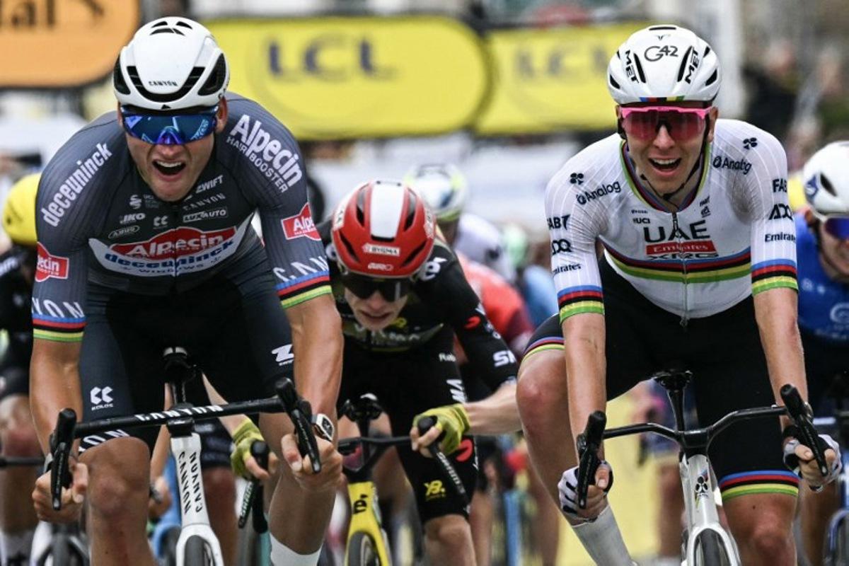 Alpecin - Deceuninck team's Dutch rider Mathieu van der Poel (L) sprints to the finish line to win ahead of UAE Team Emirate - XRG team's Slovenian rider Tadej Pogacar, taking second place and Team Visma - Lease a bike team's Danish rider Jonas Vingegaard (C) taking third place during the 2nd stage of the 112th edition of the Tour de France cycling race, 209.1 km between Lauwin-Planque and Boulogne-sur-Mer, Northern France, on July 6, 2025.  Loic VENANCE / AFP