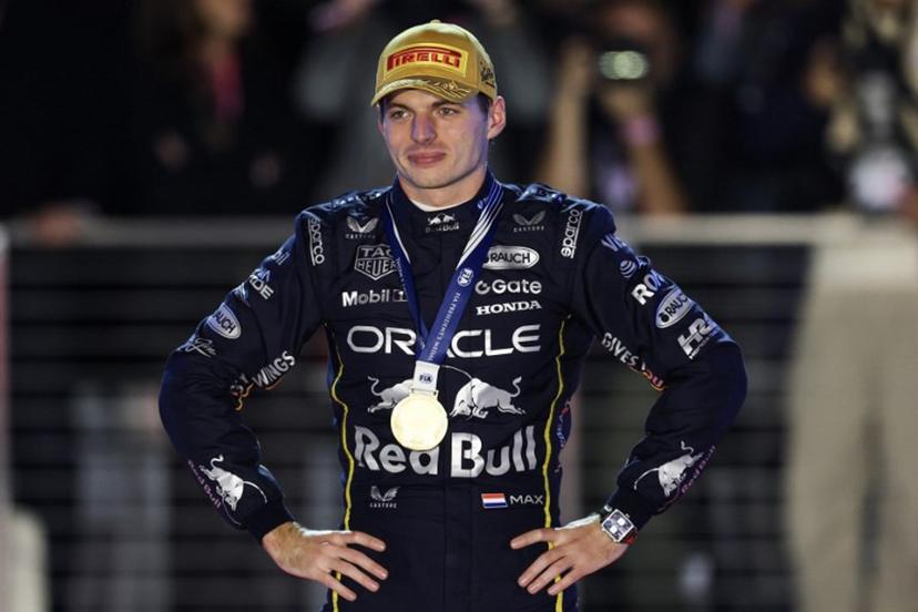 Race winner Red Bull Racing's Dutch driver Max Verstappen stands on the podium after the Las Vegas Formula One Grand Prix at the Las Vegas Strip Circuit in Las Vegas, Nevada, on November 22, 2025.  Patrick T. Fallon / AFP