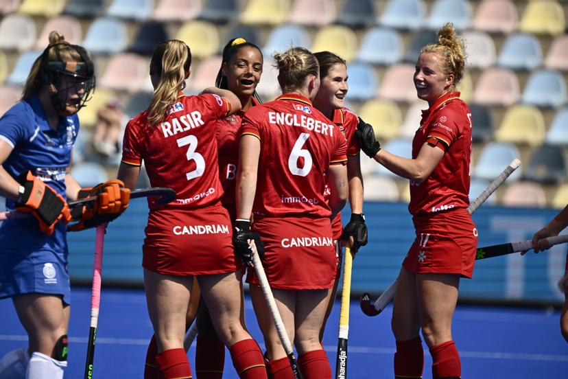 Belgium's Ambre Ballenghien celebrates with Belgium's Justine Rasir and Belgium's Charlotte Englebert at a hockey game between Scotland and the Belgian national team Red Panthers, match 3/3 in the pool stage of the 2025 women's European championships, Wednesday 13 August 2025 in Monchengladbach, Germany.  BELGA PHOTO ERIC LALMAND