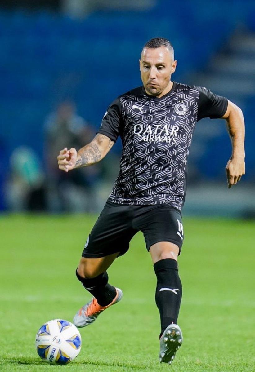 Sadd's midfielder Santi Cazorla runs with the ball during the AFC Champions League group E match between Qatar's al-Sadd and Jordan's al-Wehdat at Prince Mohamed bin Fahd Stadium in Saudi Arabia's Dammam on April 15, 2022.  Yousef DOUBISI / AFP