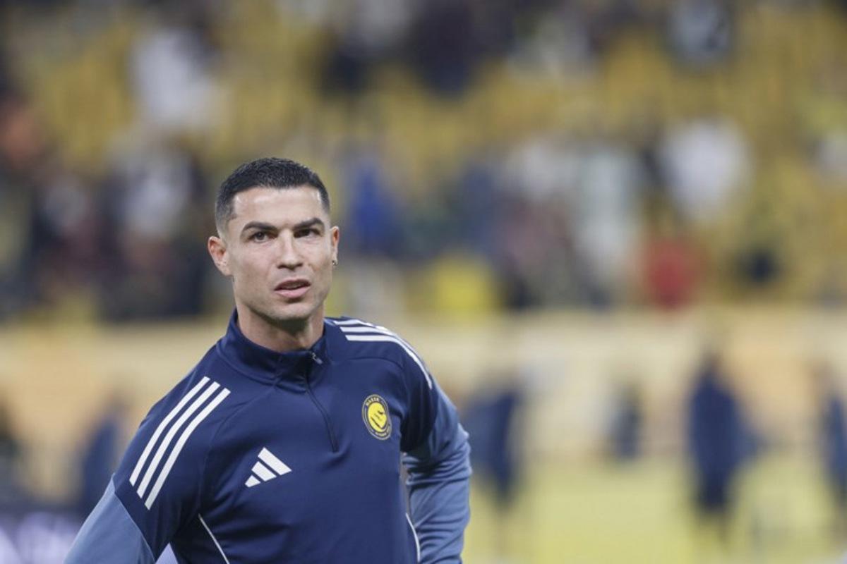 Nassr's Portuguese forward #07 Cristiano Ronaldo reacts during warm up prior to the Saudi Pro League football match between Al-Nassr and Al-Khaleej at Al-Awwal Park in Riyadh on November 23, 2025.  Fayez NURELDINE / AFP