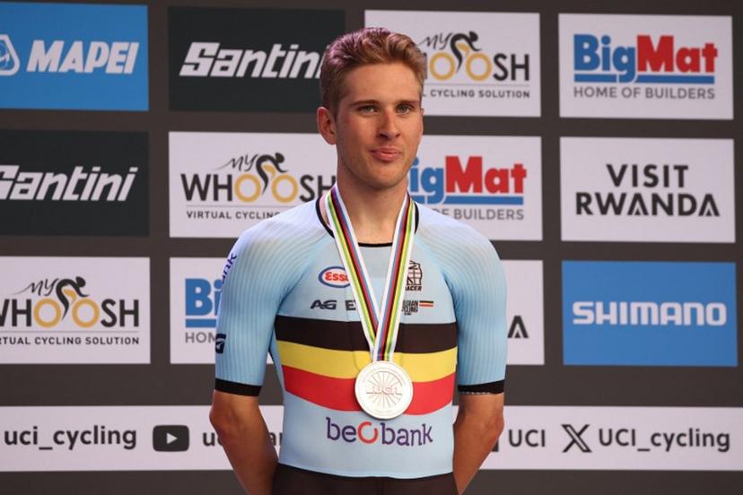 Bronze medallist Belgian rider Ilan van Wilder stands on the podium following the men's Elite Individual Time Trial cycling event during the UCI 2025 Road World Championships, in Kigali, on September 21, 2025.  Anne-Christine POUJOULAT / AFP