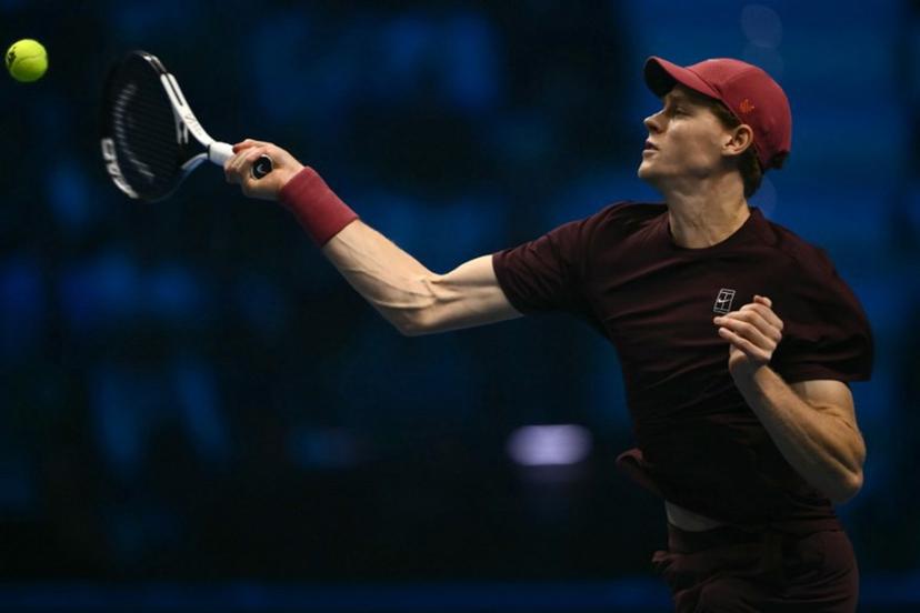 Italy's Jannik Sinner hits the ball during his match against Canada's Felix Auger-Aliassime at the ATP Finals tennis tournament in Turin on November 10, 2025.  Marco BERTORELLO / AFP