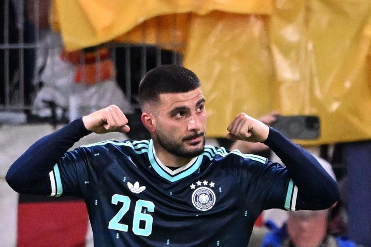Germany's forward #26 Deniz Undav celebrates scoring his team's first goal during a friendly match between Germany and Finland ahead of the 2026 FIFA World Cup football tournament, in Mainz, western Germany on May 31, 2026.  Kirill KUDRYAVTSEV / AFP
