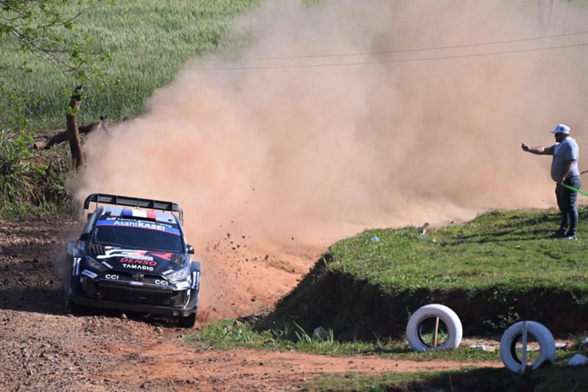 French driver Sebastien Ogier and co-driver Vincent Landais compete in their Toyota GR Yaris Rally1 compete in their Toyota GR Yaris Rally1 during the Artigas stage of the WRC Rally Paraguay, the 10th round of the FIA World Rally Championship (WRC), in General Artigas near Encarnacion, Paraguay on August 30, 2025.  Luis ROBAYO / AFP