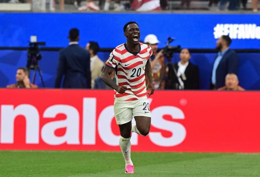 US forward #20 Folarin Balogun celebrates scoring his team's second goal during the 2026 World Cup Group D football match between USA and Paraguay at the Los Angeles Stadium in Inglewood on June 12, 2026.  Frederic J. BROWN / AFP