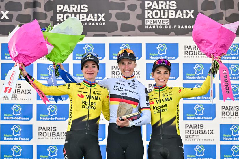 Dutch Marianne Vos of Team Visma-Lease a Bike, German Franziska Koch of FDJ United-SUEZ, French Pauline Ferrand-Prevot of Team Visma-Lease a Bike pictured on the podium after the women's Paris-Roubaix cycling race, Sunday 12 April 2026, around Roubaix, France. The 123rd edition of Paris-Roubaix cycling races will take on Sunday, with the women riding 143,1 km the men riding 258,3 km on Sunday. BELGA PHOTO DIRK WAEM