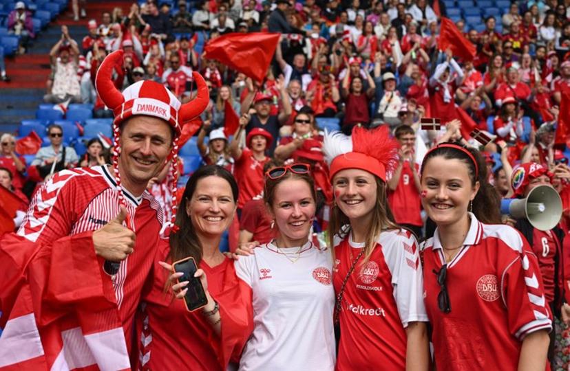 Denmark supporters pose  prior to the UEFA Women's Euro 2025 Group C football match between Germany and Denmark at the at the St Jakob-Park Stadium, in Basel on July 8, 2025.  Miguel MEDINA / AFP