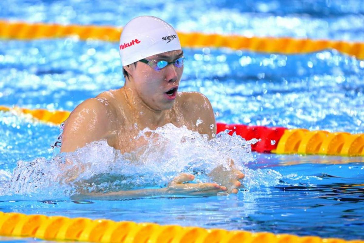 China's swimmer Qin Haiyang competes in a semi-final of the men's 200m breaststroke swimming event during the 2025 World Aquatics Championships in Singapore on July 31, 2025.  François-Xavier MARIT / AFP