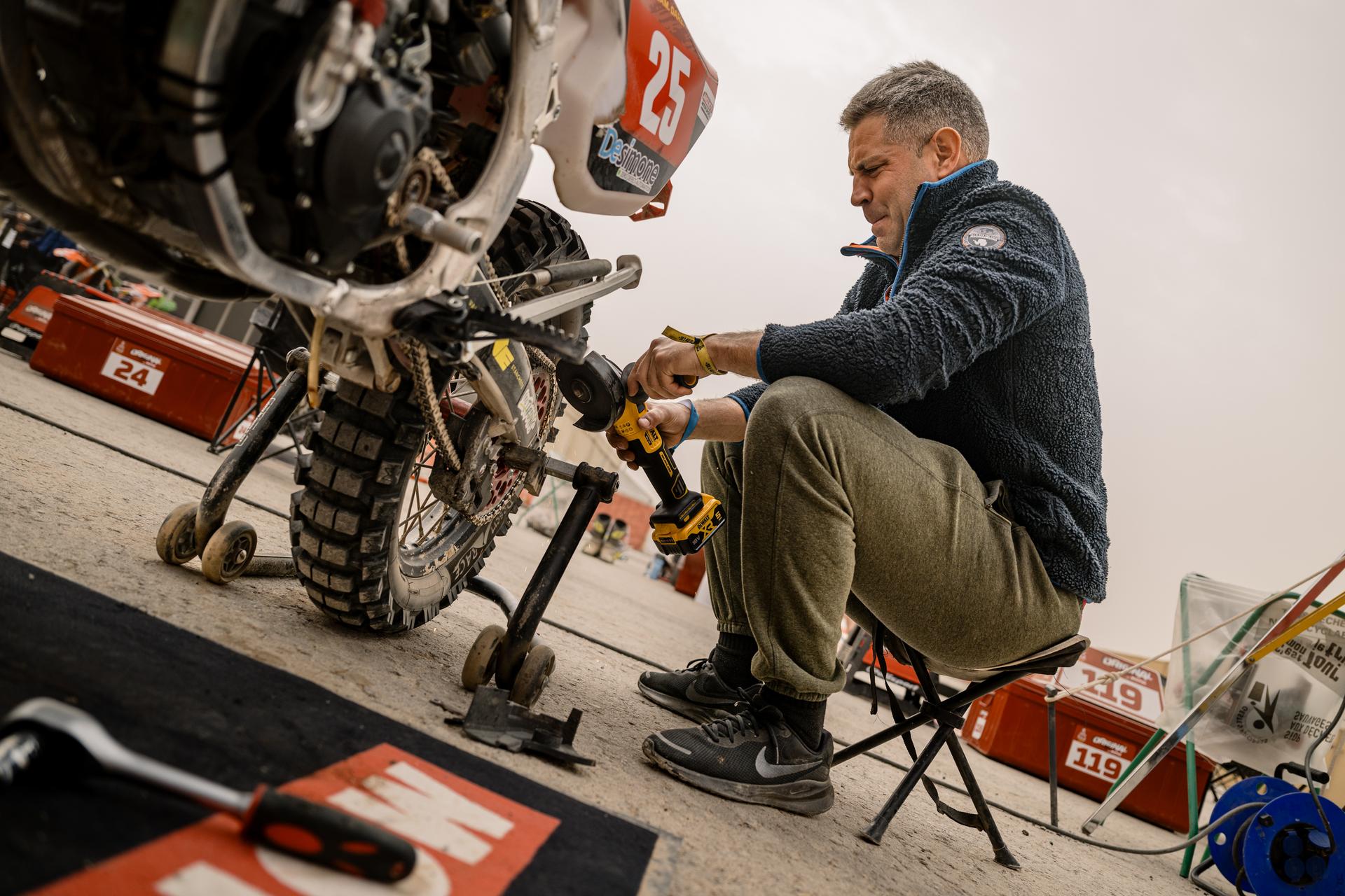 ATTENTION EDITORS - HAND OUT PICTURES - EDITORIAL USE ONLY - MANDATORY CREDIT: 'SIMON BAUCHAU'  Hand out picture released by Eric Dupain shows Jerome Martiny working on his motor during a rest day of the 2026 Dakar rally race in Ha'Il, Saudi Arabia on Saturday 10 January 2026.  *** Belga and Belga Editorial Board decline all responsibility regarding the content of this picture. *** PHOTO HAND OUT - SIMON BAUCHAU