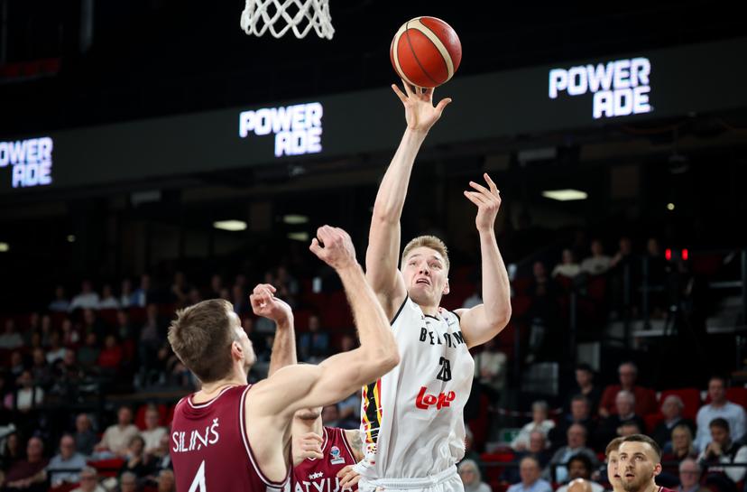 Latvian Ojars Silins and Belgium's Thijs De Ridder fight for the ball during a basketball match between Belgium's national team Belgian Lions and Latvia, Monday 25 November 2024 in Charleroi, game 4/6 in the group stage of the qualifications for the Eurobasket 2025 European championships. BELGA PHOTO VIRGINIE LEFOUR
