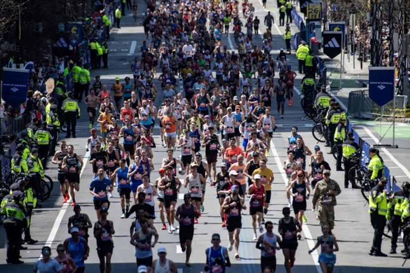 Runners make their way down Boylston Street as they compete in the 129th Boston Marathon on April 21, 2025, in Boston, Massachusetts.  The marathon includes around 30,000 athletes from 129 countries running the 26.2 miles from Hopkinton to Boston, Massachusetts.  The event is the world's oldest annually run marathon.  Joseph Prezioso / AFP
