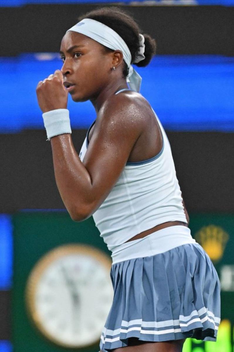 USA's Coco Gauff reacts on a point as she plays against Italy's Jasmine Paolini during their women's singles semi-final match at the Wuhan Open tennis tournament in Wuhan, Central China's Hubei province on October 11, 2025.  ADEK BERRY / AFP